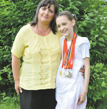 Maria Sasu,  olimpică de aur la concursurile de română şi matematică