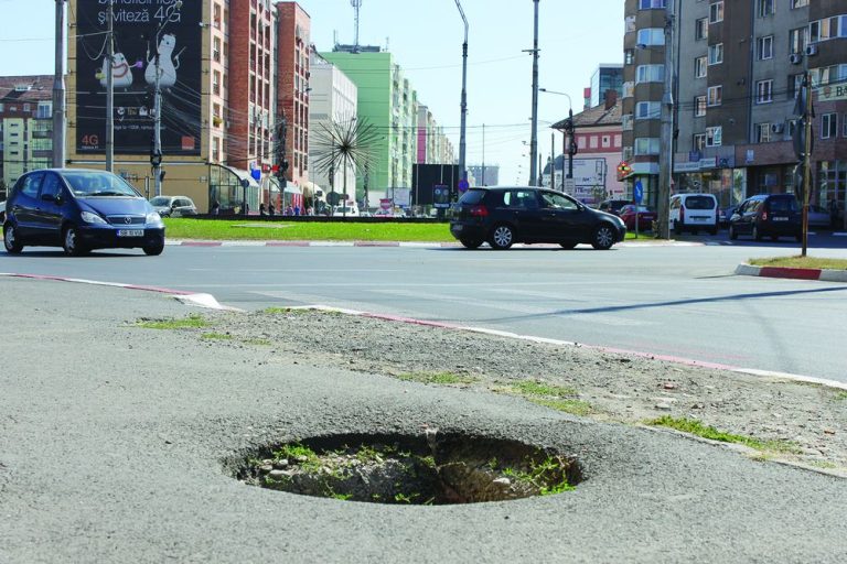 Gaură în trotuar