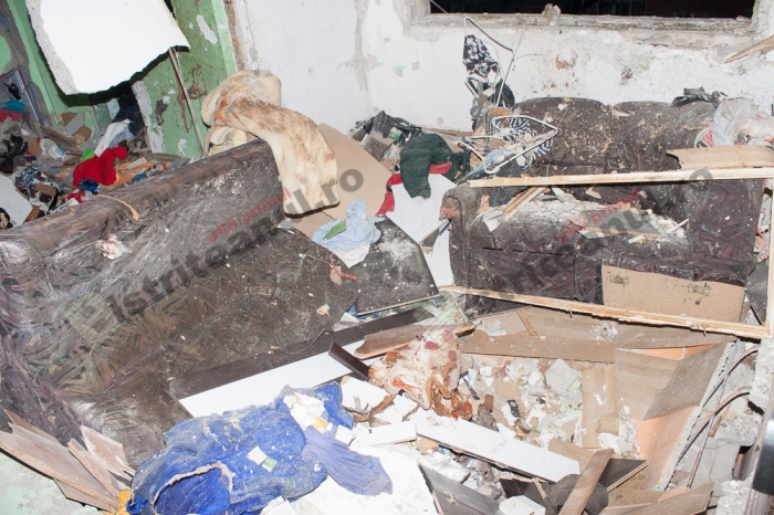 FOTO – Explozie într-un bloc. 8 persoane au fost rănite