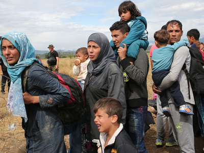 Rețea de trafic de migranți spre Marea Britanie, destructurată în urma unor raiduri în țări europene